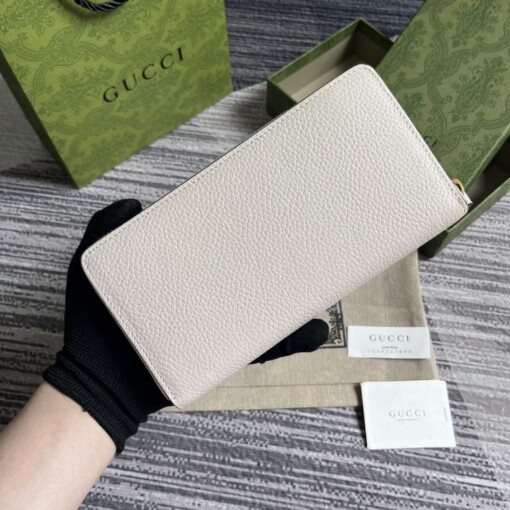 Replica Gucci 750458 Zip wallet with Interlocking G python bow White