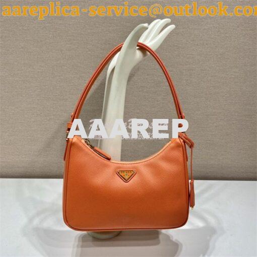 Replica Prada Re-Edition Orange Saffiano leather mini-bag with adjusta